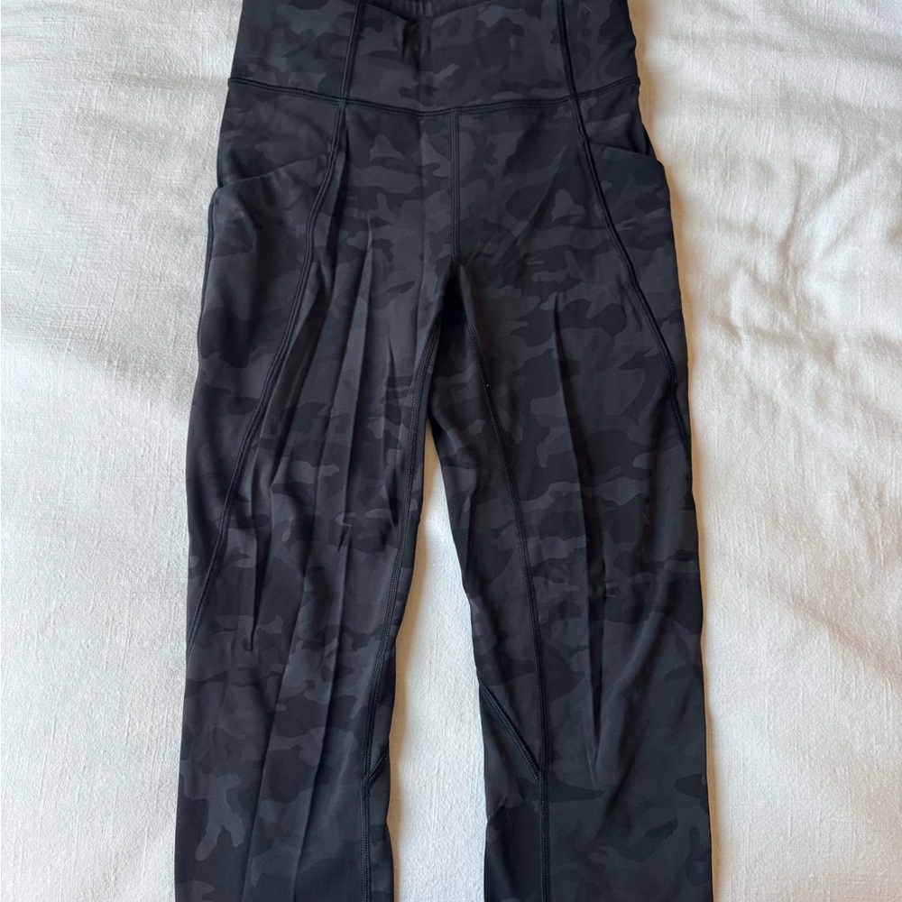 Woman’s Lululemon size 4 Black Camouflage Leggings